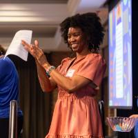 committee member applauding